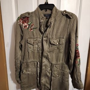 Kelly Renee shirt jacket adorned with roses.